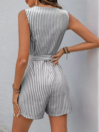 Back view of a striped V-neck belted romper, showcasing a chic design and tailored fit, ideal for stylish summer wear.