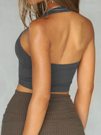 Back view of a gray halter neck active cami, highlighting its simple design and moderate stretch fabric.