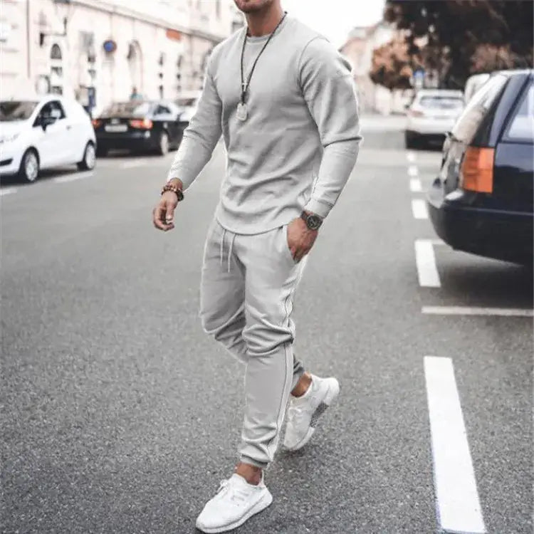 Men's full size round neck long sleeve top and pants set in grey, styled for casual wear.