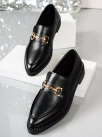 Point toe black block heel loafers with gold detail, stylish and comfortable shoes for everyday wear.
