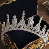 a tiara in a case on a table