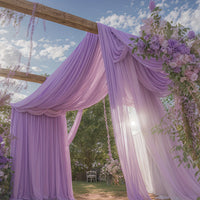 a purple canopy with flowers hanging from it