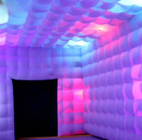 an inflatable room with a black door in it