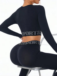Model showcasing a Letter Print Round Neck Long Sleeve Top and Leggings Active Set in black, designed for comfort and stretch.