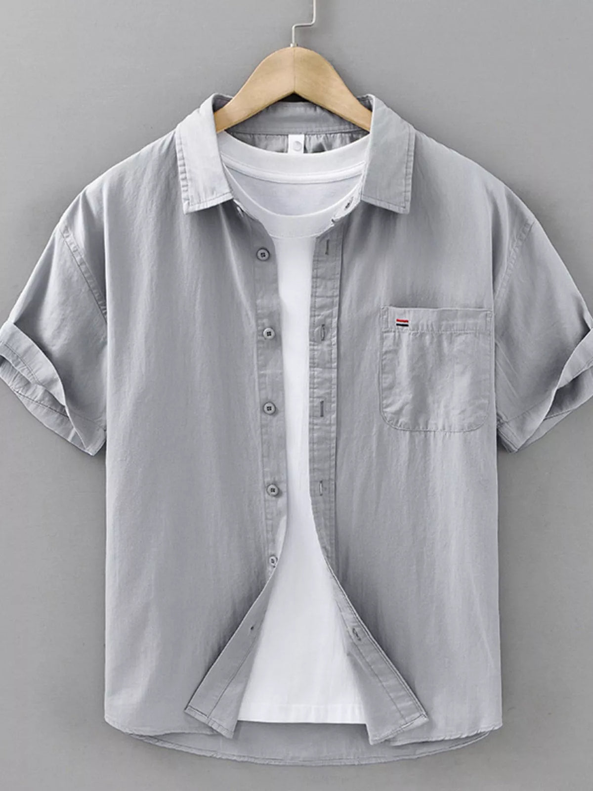 Men's plus size short sleeve button-up shirt in gray, featuring a pocket and layered white t-shirt underneath.