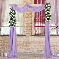 a couple of purple drapes sitting next to each other