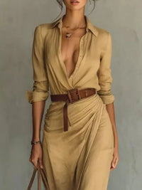 Full Size Ruched Long Sleeve Maxi Dress Plus Size in a tan color with a belted waist and long sleeves.