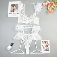 a white lingerie with feathers on it