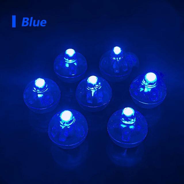 a group of blue lights sitting on top of a table
