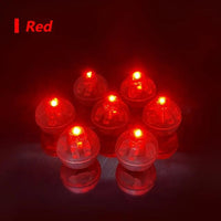 a group of red lights sitting on top of a table