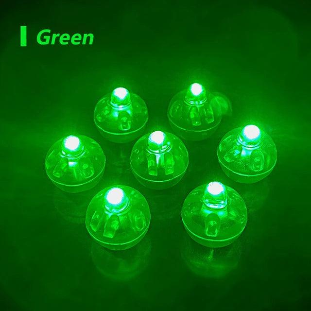a group of green lights sitting on top of a table
