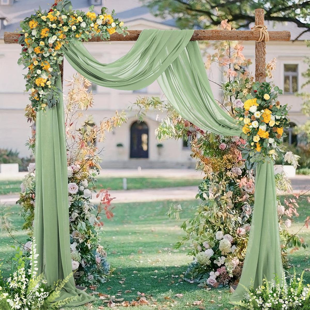 a wedding arch decorated with flowers and greenery