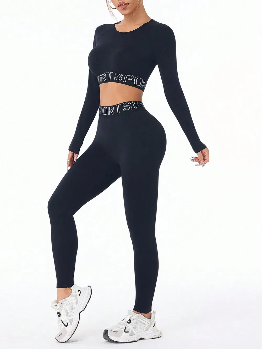 Black letter print long sleeve crop top and leggings activewear set, ideal for workouts and casual wear.