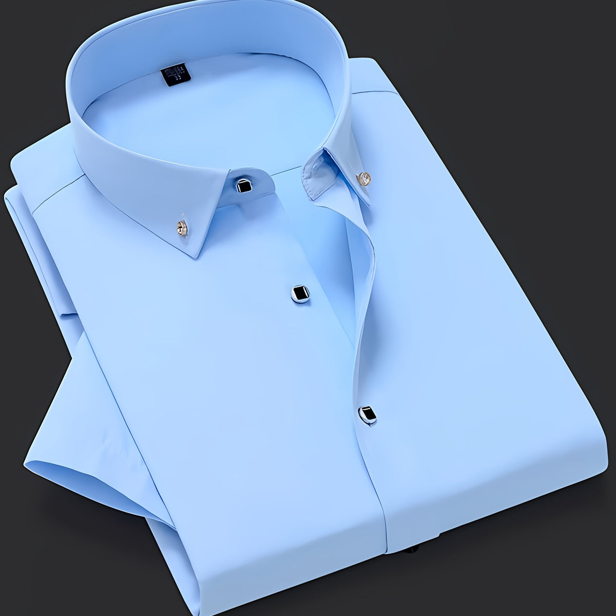 a light blue dress shirt on a black background