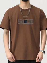 Men's brown short sleeve t-shirt featuring a graphic print, ideal for casual style and comfort.