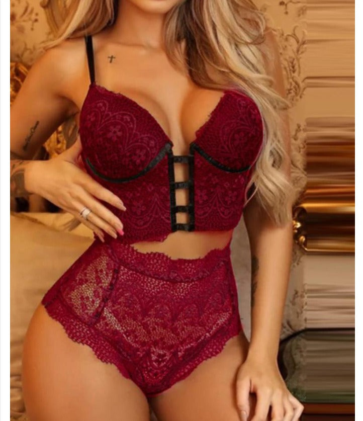 a woman in a red lingerie posing for the camera