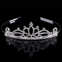 a tiara on a black background