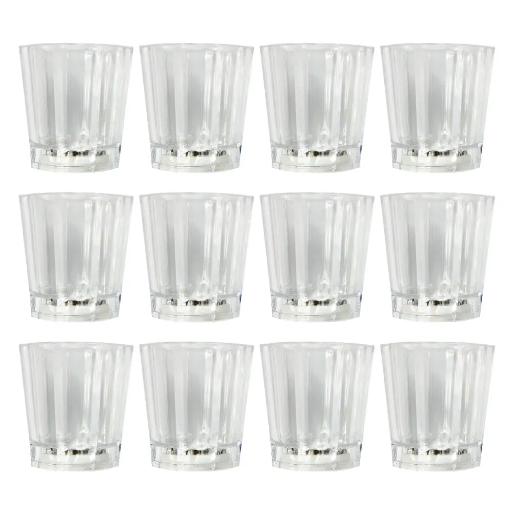 a set of twelve clear glass tumblers on a white background