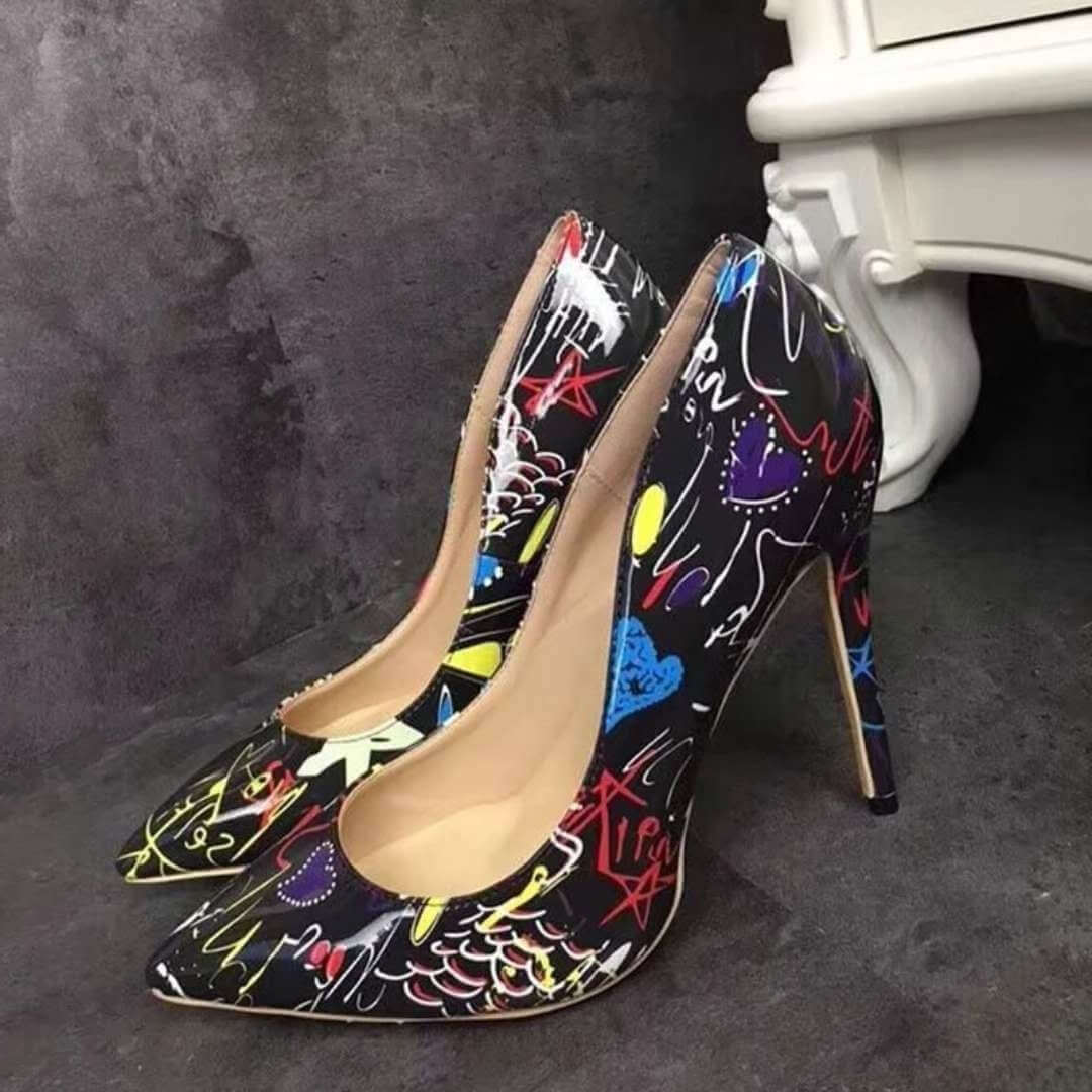 Women’s Graffiti high heel pumps showcasing colorful designs, perfect for formal wear & accessories in NZ.