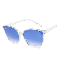 Ladies round frame sunglasses with blue lenses, perfect for formal wear & accessories in NZ.