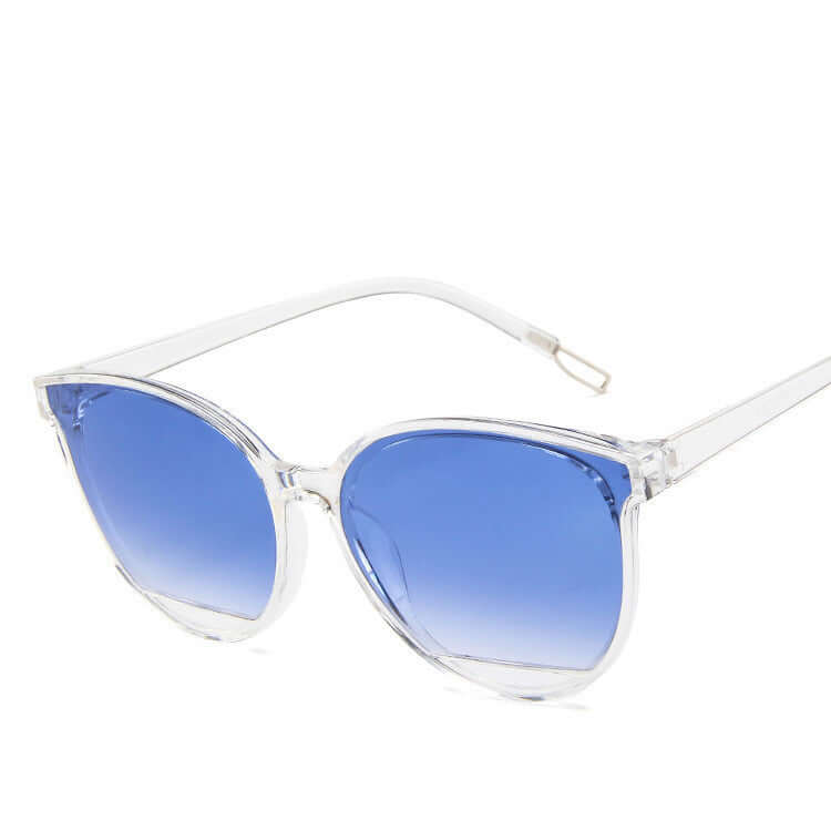 Ladies round frame sunglasses with blue lenses, perfect for formal wear & accessories in NZ.