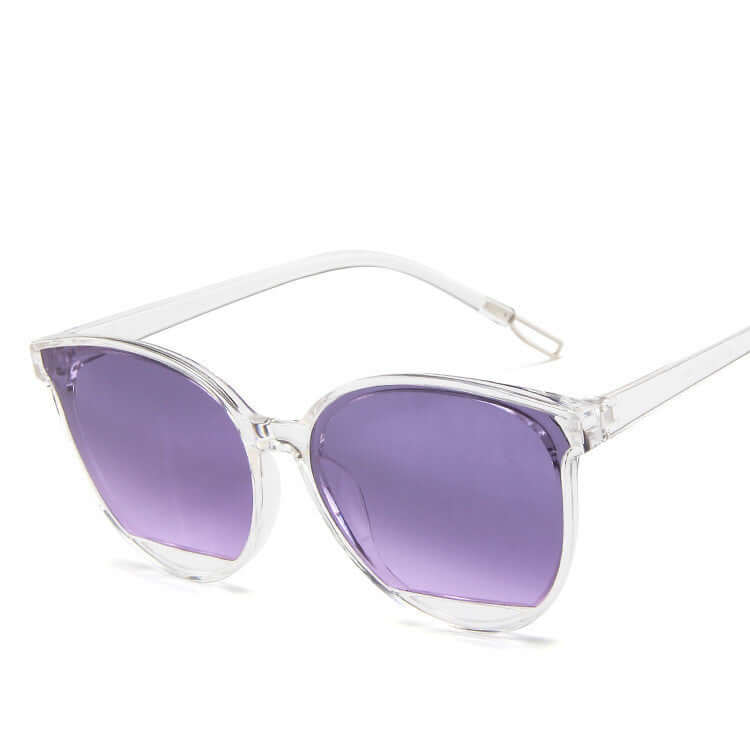 Sunglasses with clear frames and purple lenses, perfect for ladies' formal wear & accessories NZ.