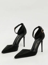 a pair of black high heeled shoes