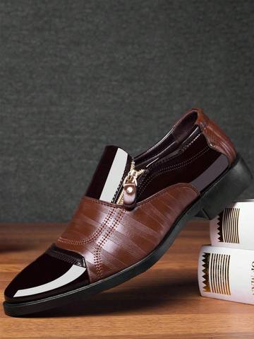 a pair of shoes sitting on top of a wooden table