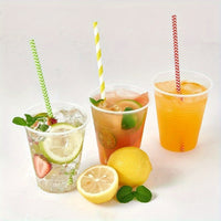 three different types of drinks with straws and lemons