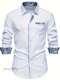 a white shirt with a paisley print pocket