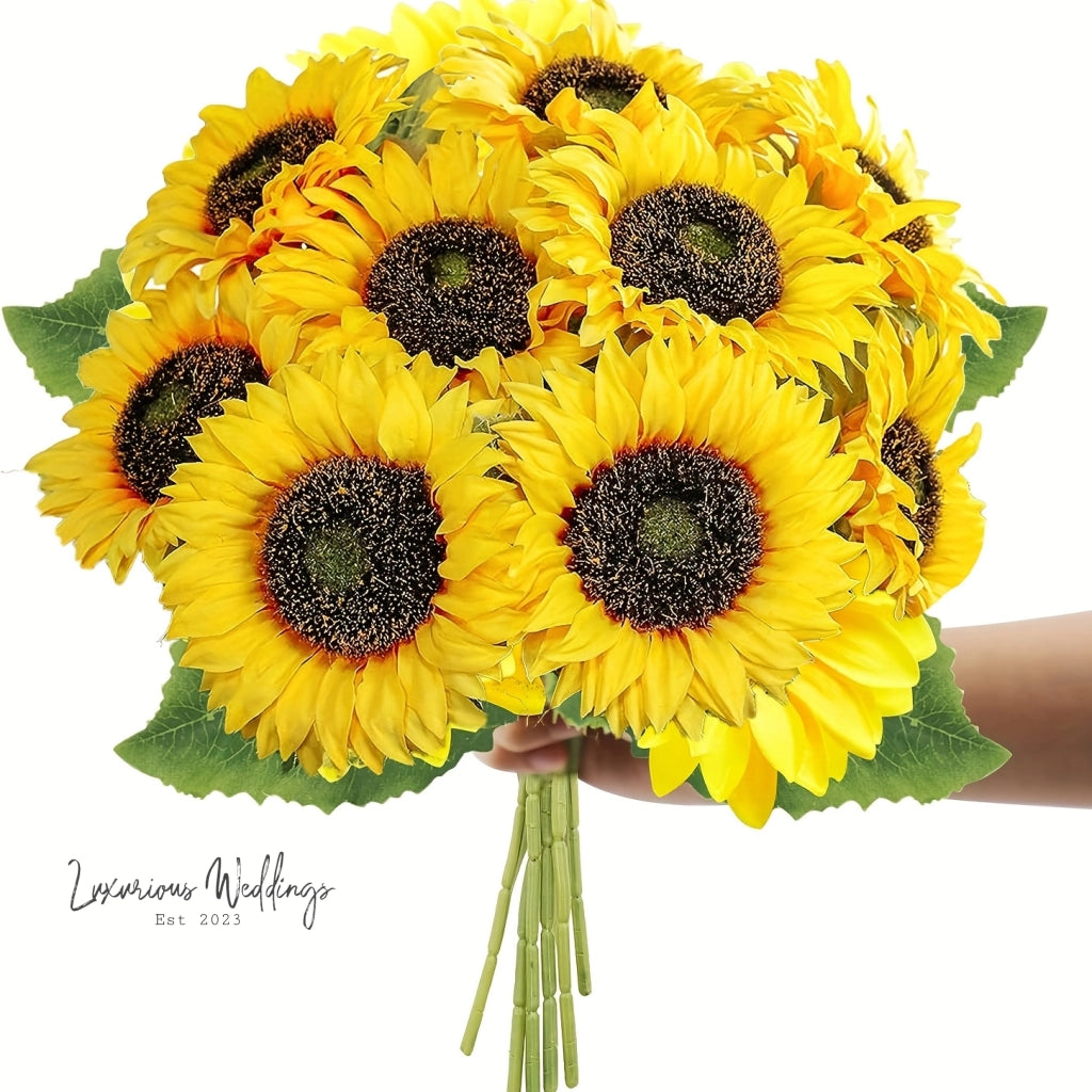 a bouquet of sunflowers held in a hand