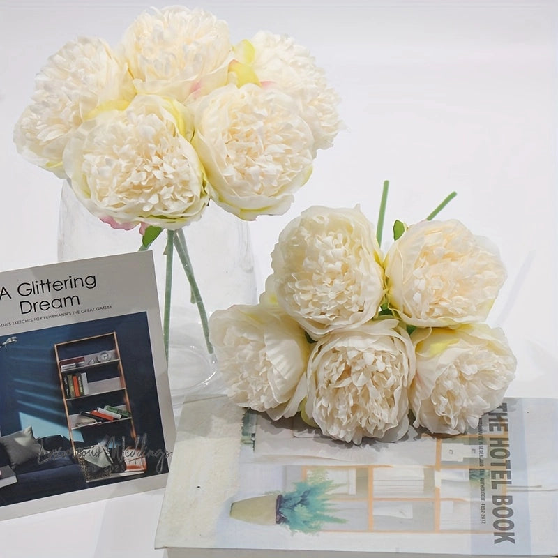 a bunch of flowers sitting on top of a table