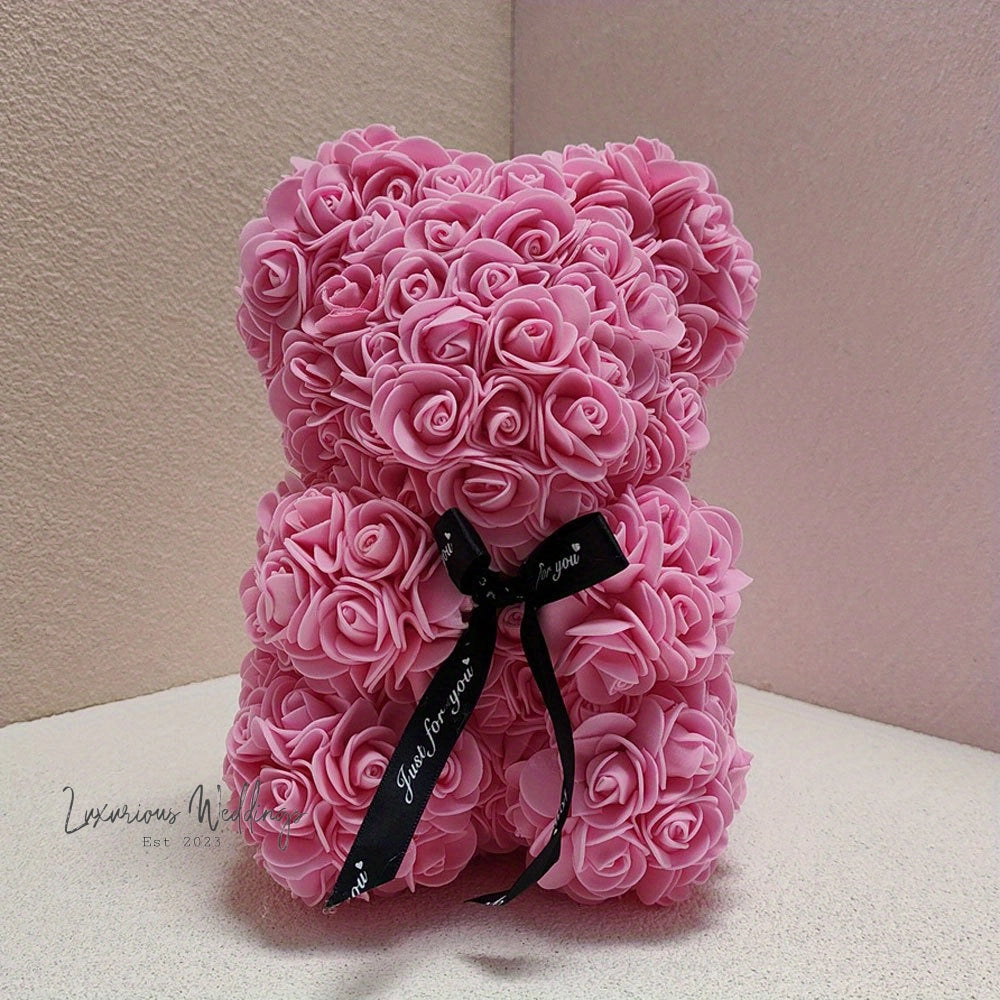 a teddy bear made out of pink roses