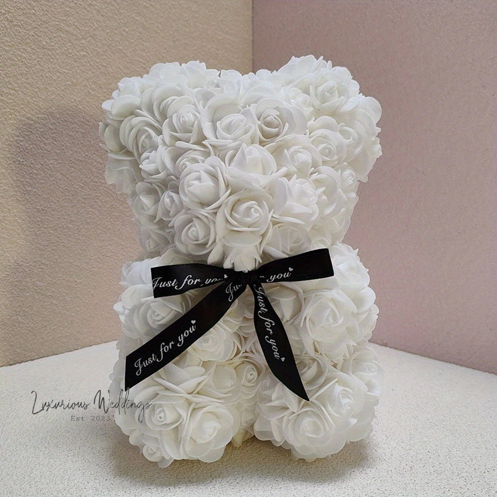a teddy bear made out of white roses