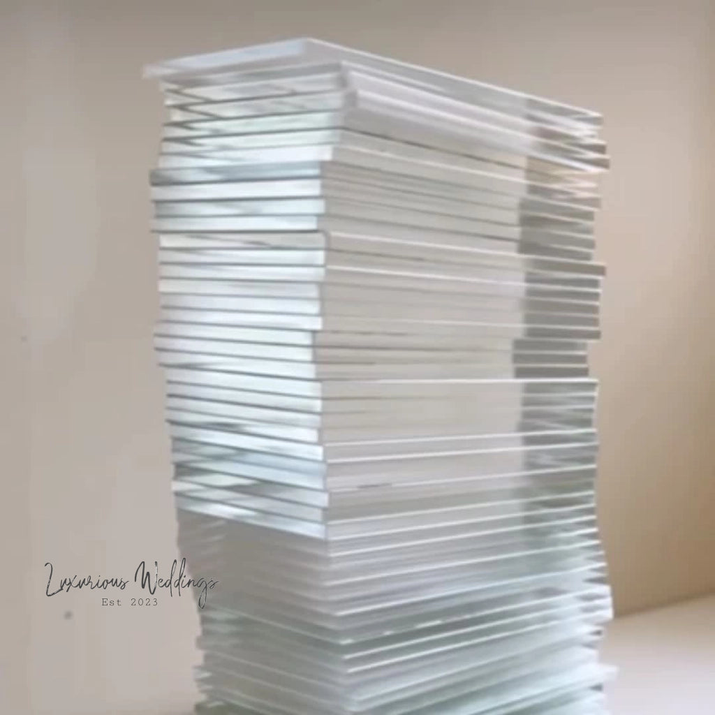 a stack of papers sitting on top of a table