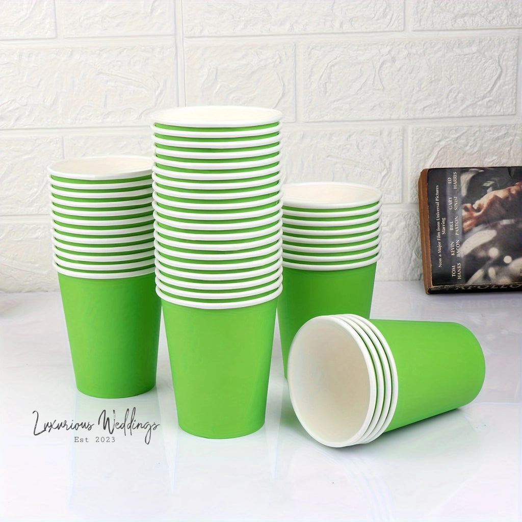 a group of green cups sitting on top of a table