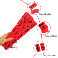 a hand holding a red plastic object with instructions on how to use it