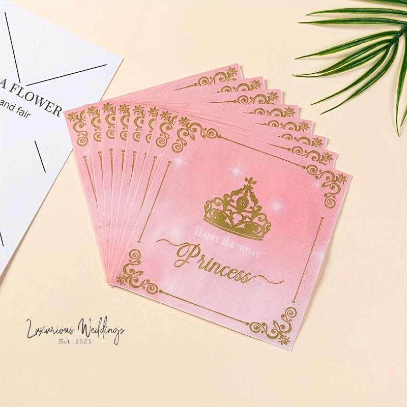 a bunch of pink cards with a gold crown on them
