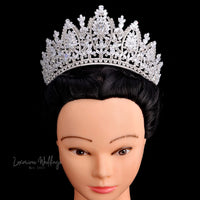 a mannequin head wearing a tiara