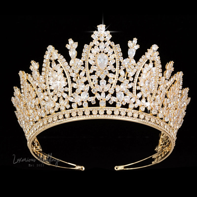 a gold tiara with a lot of diamonds on it
