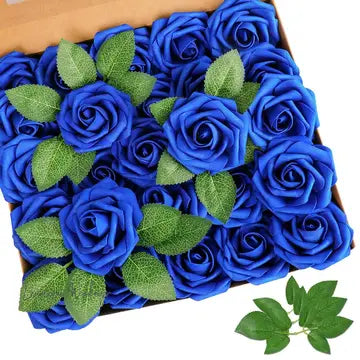 a box of blue roses with green leaves
