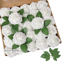 a box of white roses with green leaves