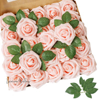 a box of pink roses with green leaves