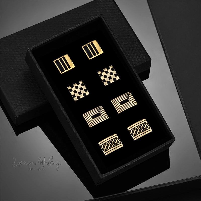 a black box with a set of four matching cuff links