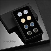 a set of four cufflinks in a black box