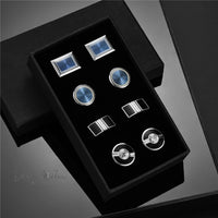 a pair of cufflinks in a black box