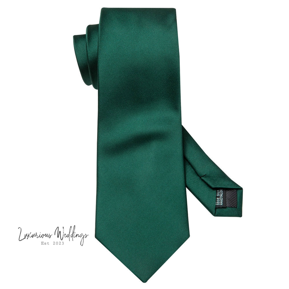 a green neck tie with a tag on it