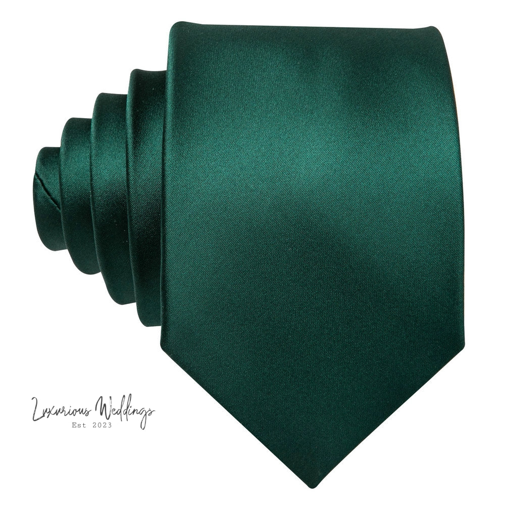 a close up of a green tie on a white background