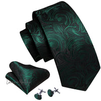 a green tie and matching cufflinks