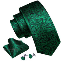 a green tie and matching cufflinks